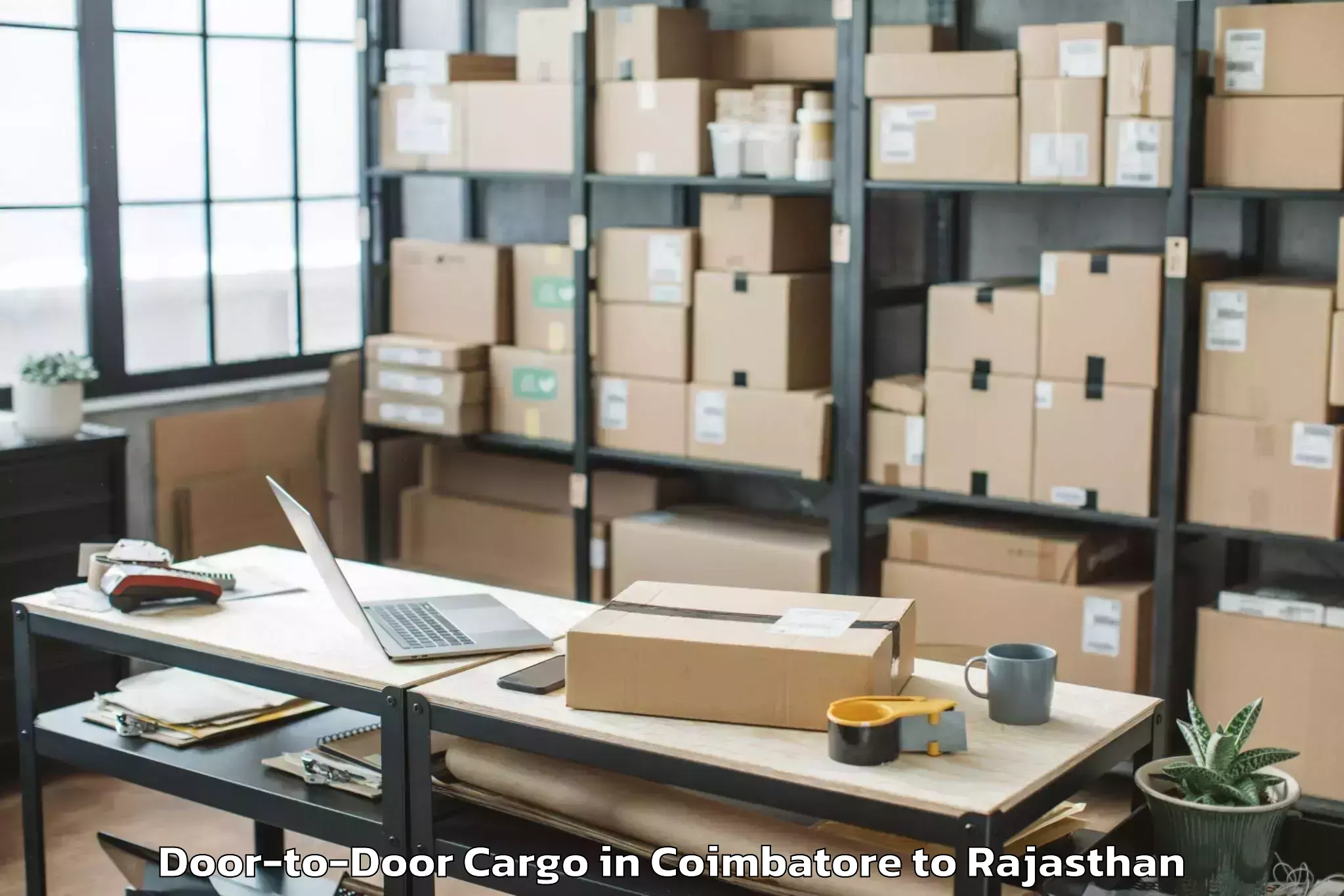 Easy Coimbatore to Jalor Door To Door Cargo Booking